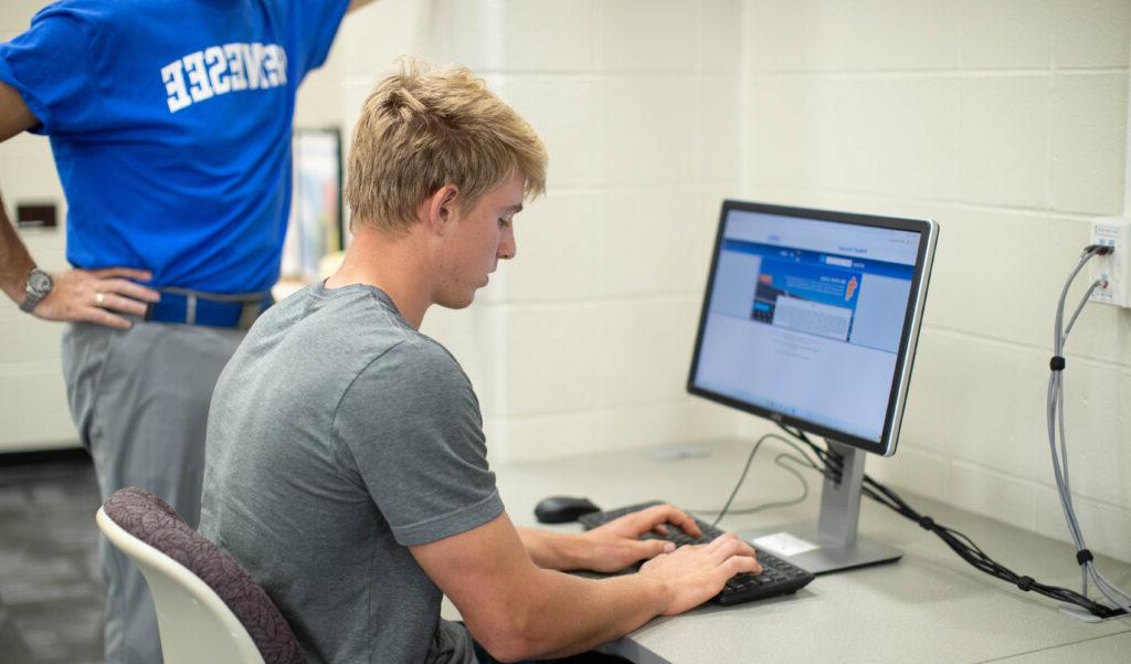 student on computer